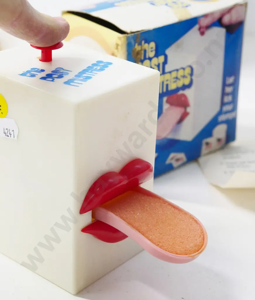 The Post Mistress novelty extending-tongue stamp/envelope licking device - H-160 including plunger Image 1++