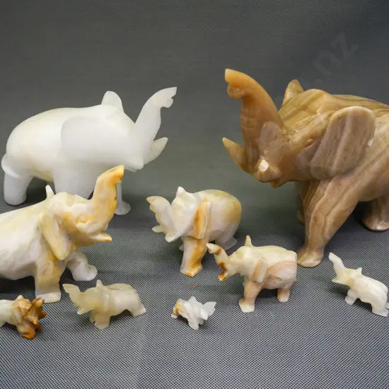 collection of alabaster carved elephants - varied sizes, several have chips, incl. broken tusk on largest H-190 L-220