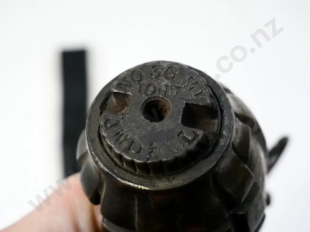 2 British War Service medals 1939-45, and a modified 'Mills Bomb' style hand grenade Image 1++