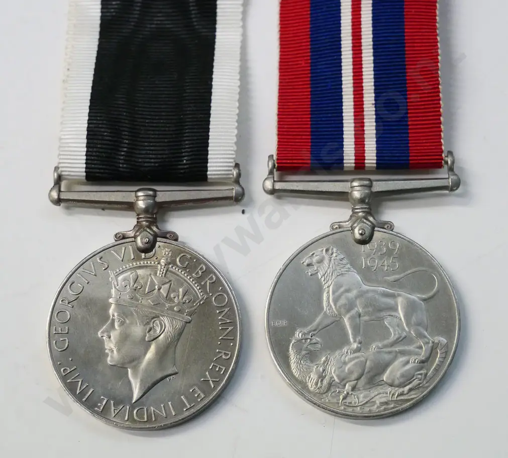 2 British War Service medals 1939-45, and a modified 'Mills Bomb' style hand grenade Image 1++