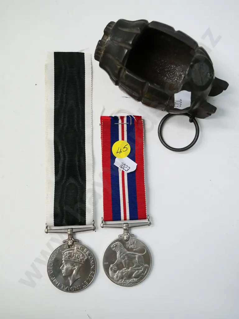 2 British War Service medals 1939-45, and a modified 'Mills Bomb' style hand grenade Image 1++