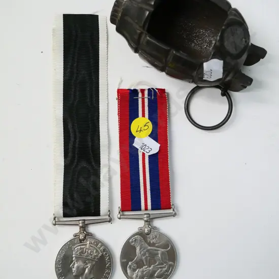 2 British War Service medals 1939-45, and a modified 'Mills Bomb' style hand grenade