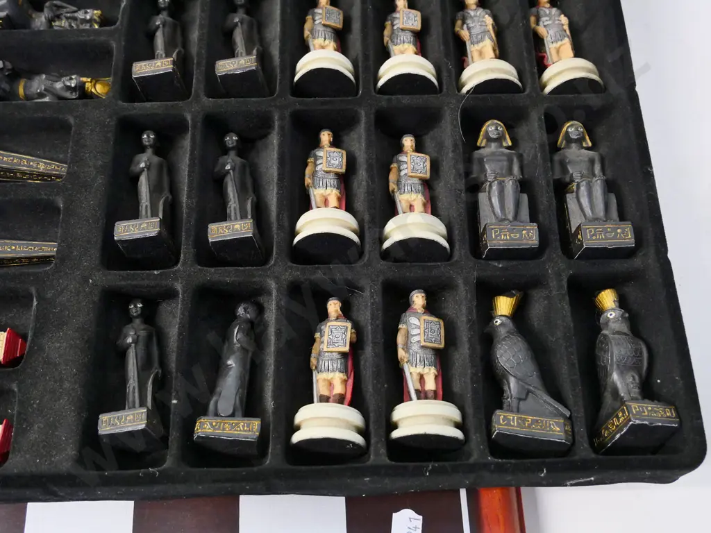composite Romans versus Egyptians chess set with wood and plastic board Image 1++