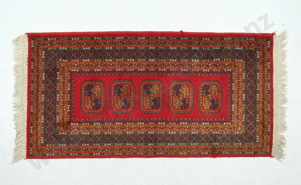 small hand-knotted woollen floor rug - dark red, brown and black L-1180 W-600 Image 1++