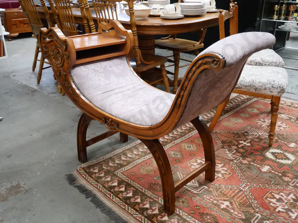 Empire-style (walnut?) seat with carved facings, studded upholstery, splitting to veneer on shelf end H820 W1170  D460 Image 1++