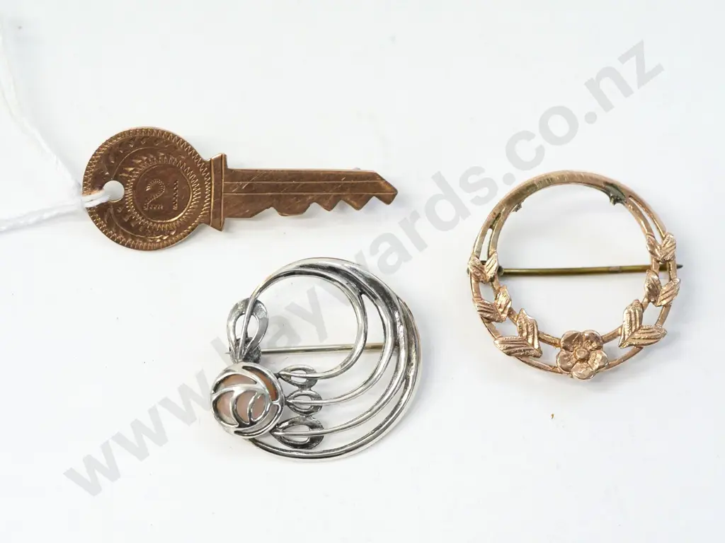 9ct key 21st brooch, round open flower brooch & silver brooch Image 1++