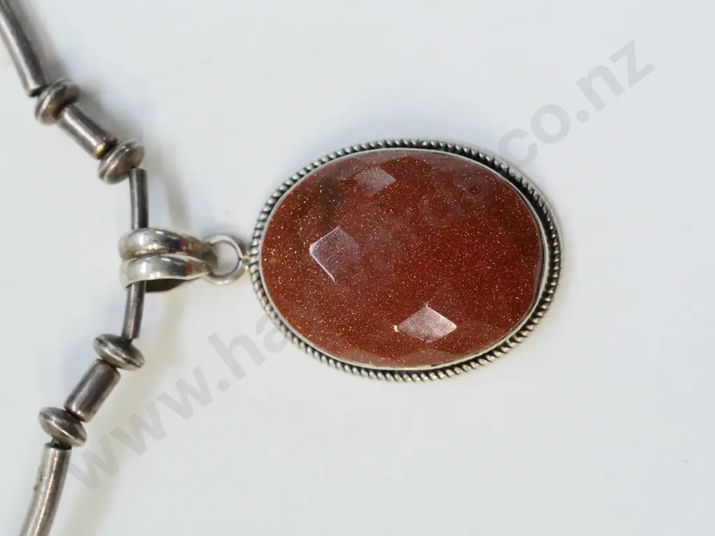 silver brown stone? pendant stamped 925 Image 1++