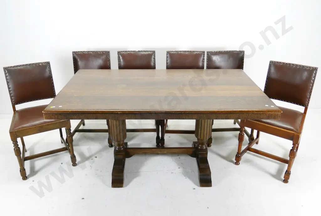 oak deco style twin column dining table w/6 studded leatherette chairs, wear to polish on top H750 L1520 W900 Image 1++