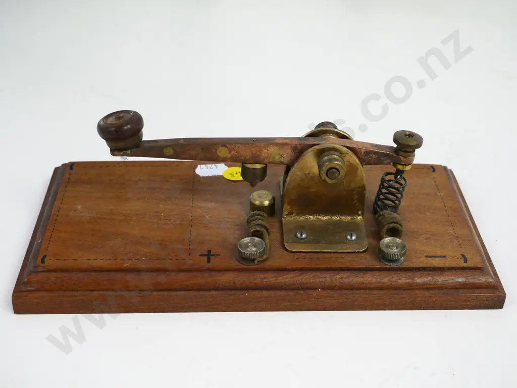 brass and copper telegraph key on wooden base Image 1++