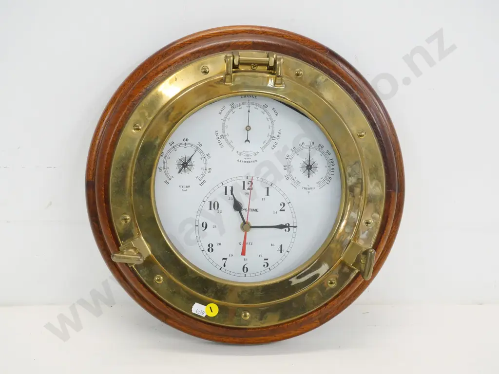 brass ship's porthole with wooden frame and modern clock movement fitted Diameter 360 Image 1++