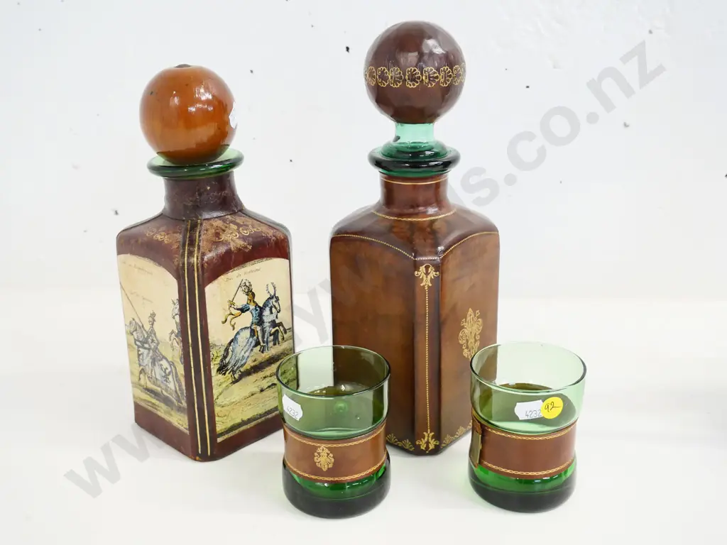 leather covered green glass items -  2 decanters, taller is H-290 and 2 tumblers Image 1++