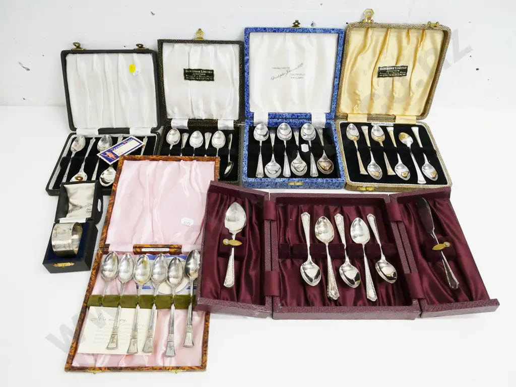 sterling silver napkin ring and 6 cased sets of plated teaspoons including 1 set apostle spoons. One has spoon missing Image 1++