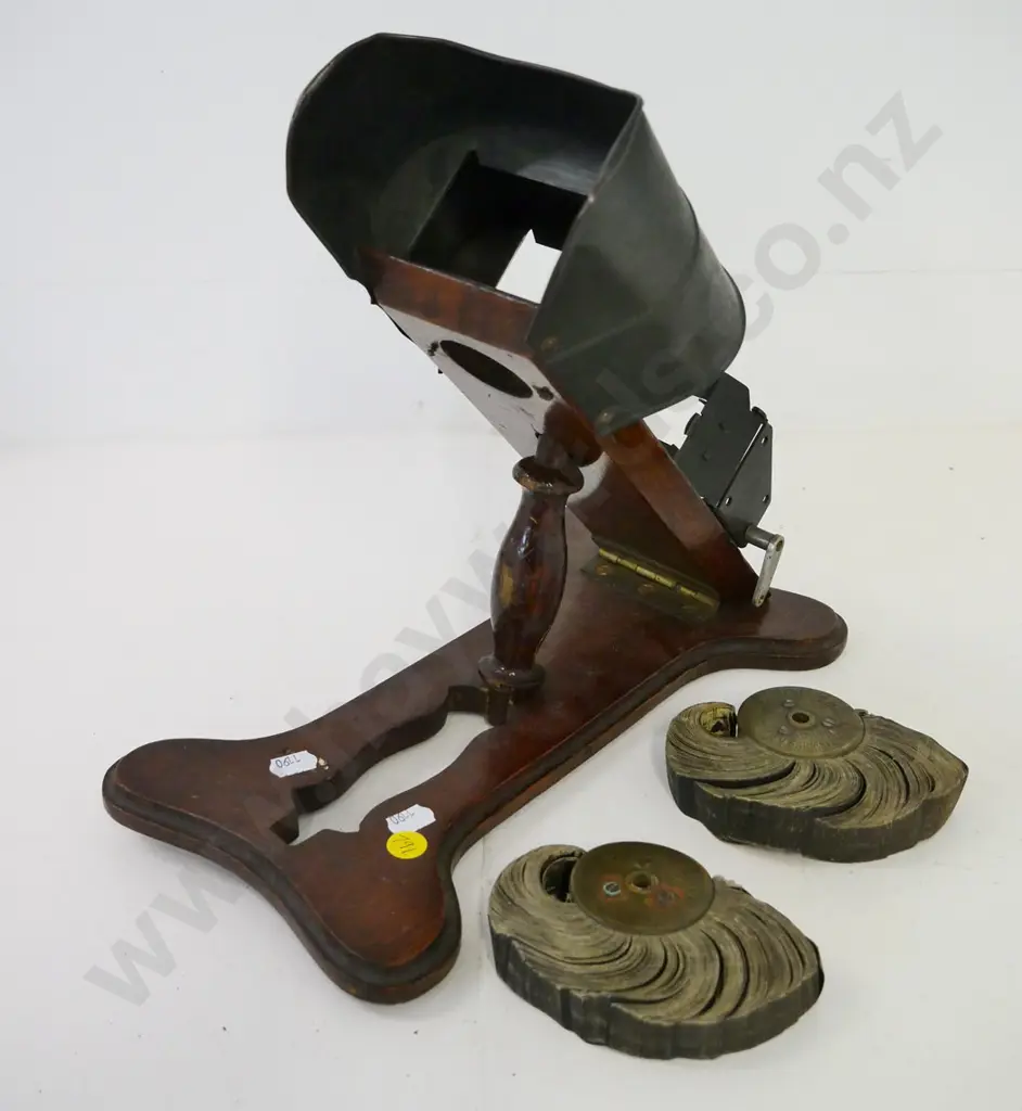 restorers vintage Kinora motion picture device with 2 reels, made by B.M Biograph Co. Image 1++