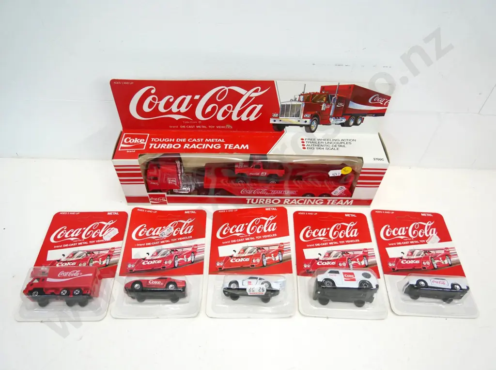 Coca-Cola branded die-cast model vehicles - large race team transporter and 5 small carded Image 1++