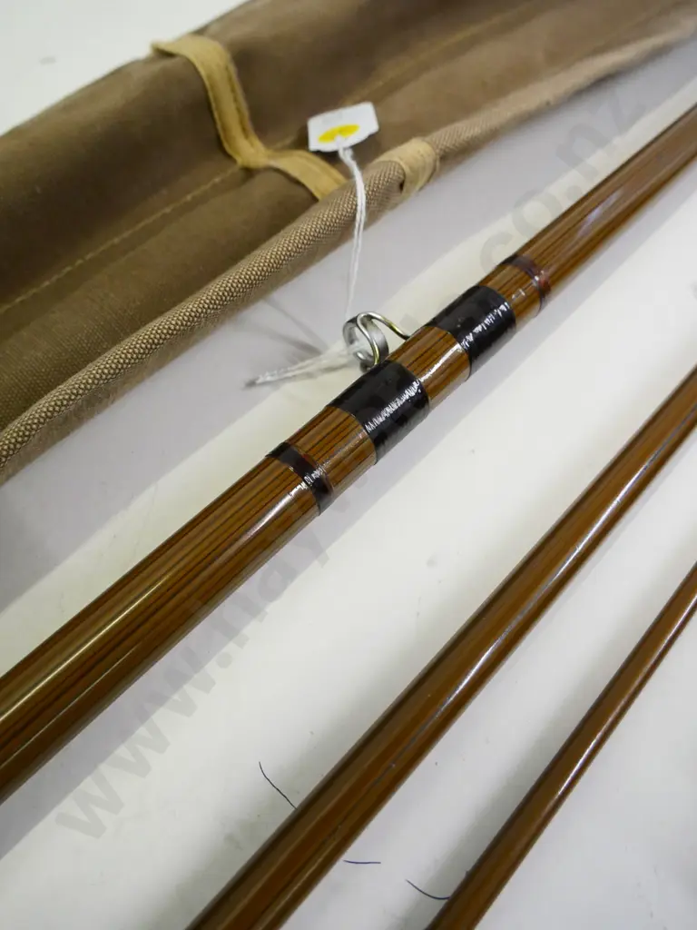 3-piece Apollo tubular steel fly rod in canvas sleeve Image 1++