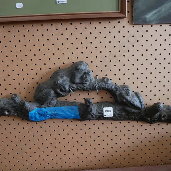 cast iron frog theme on branch coat hooks