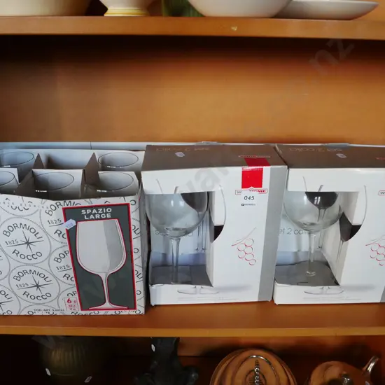 shelf of wine glasses