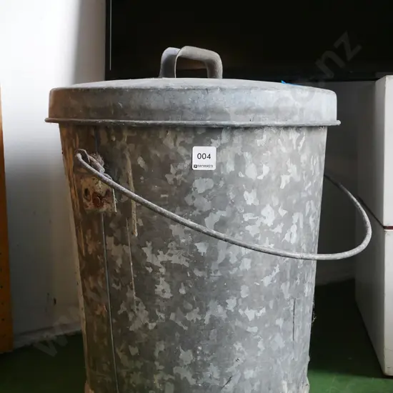galvanised lidded ash can