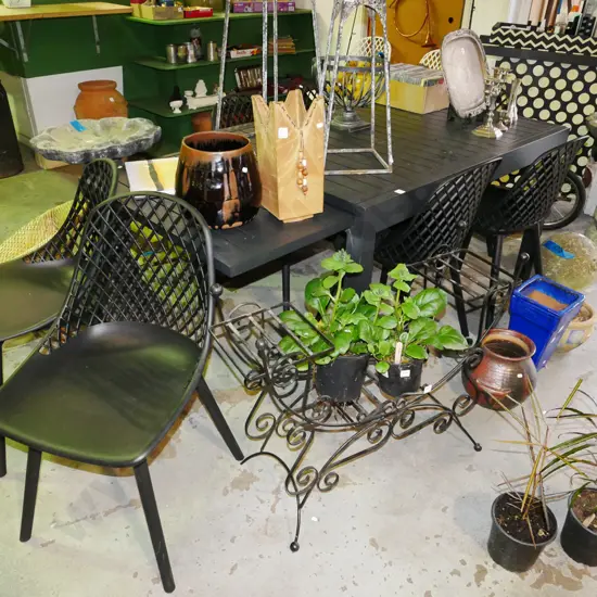 modern alloy extending outdoor table with 7 matching black composite chairs H-760 D-1800 D-900