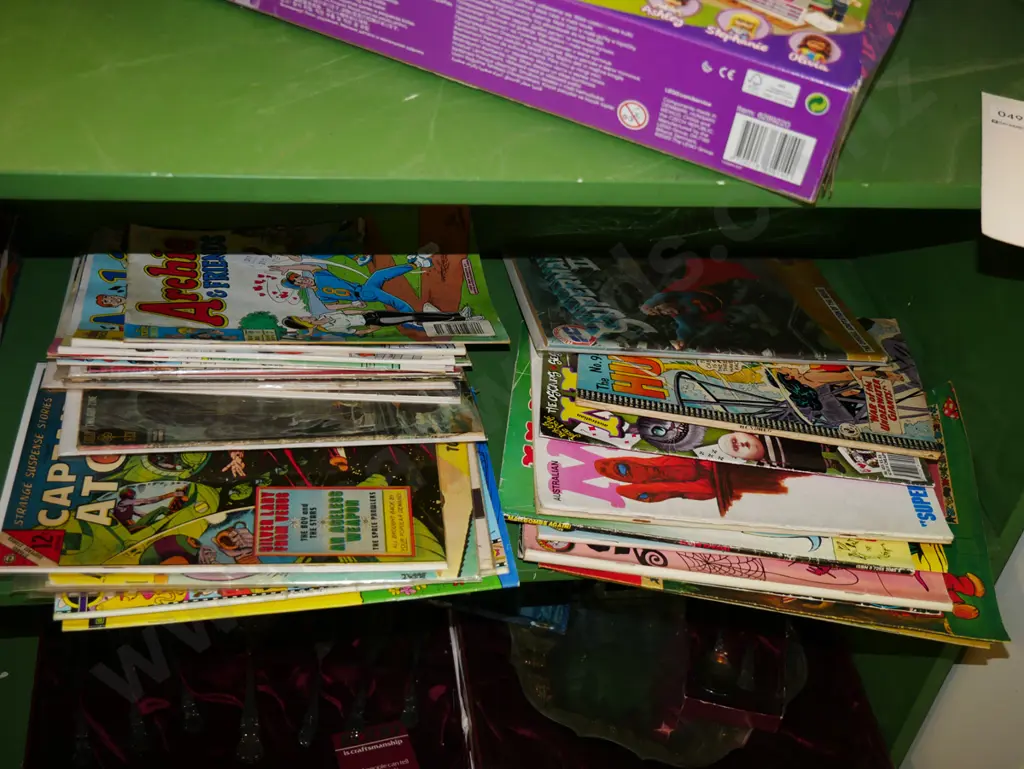 stack of comic books Image 1++