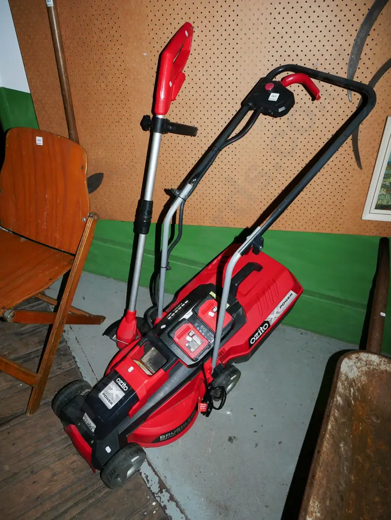 Ozito battery powered lawn mower, line trimmer Image 1++