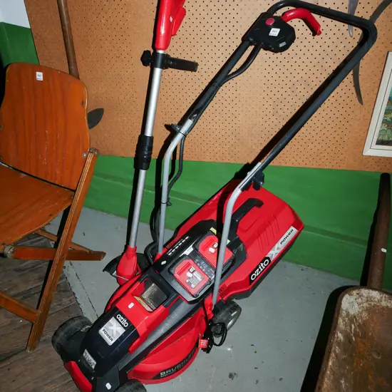 Ozito battery powered lawn mower, line trimmer