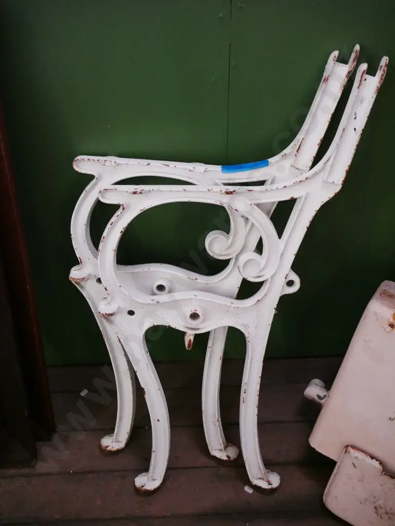 pair of cast iron garden bench seat ends Image 1++