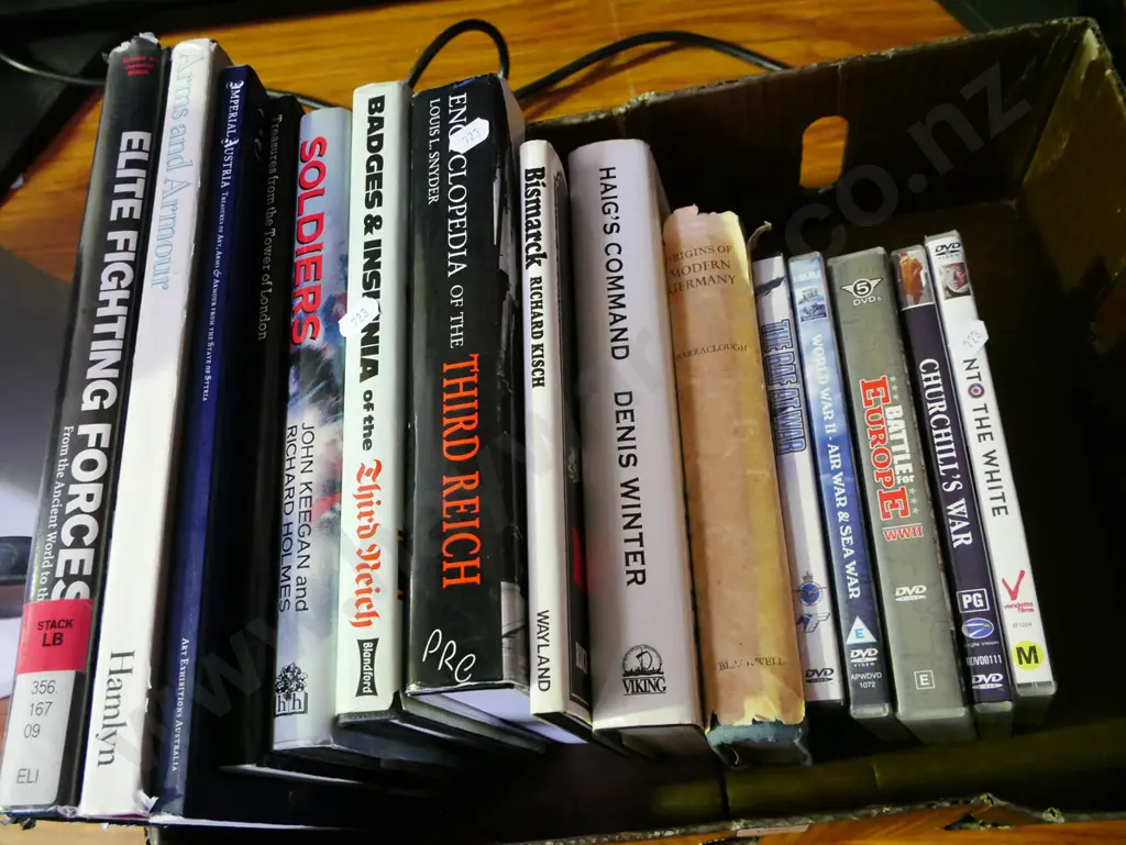 box; books about war, DVDs Image 1++