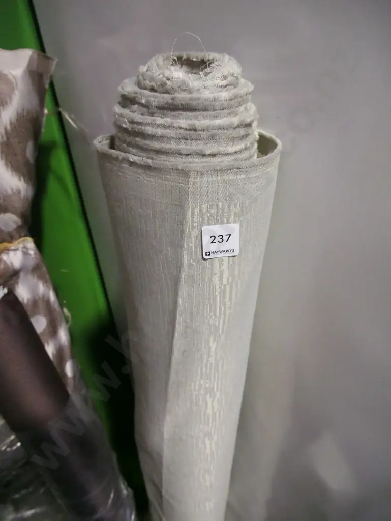 bolt of grey upholstery fabric Image 1++