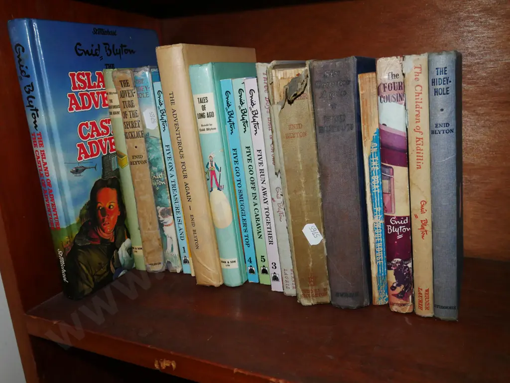 shelf of Enid Blyton books Image 1++