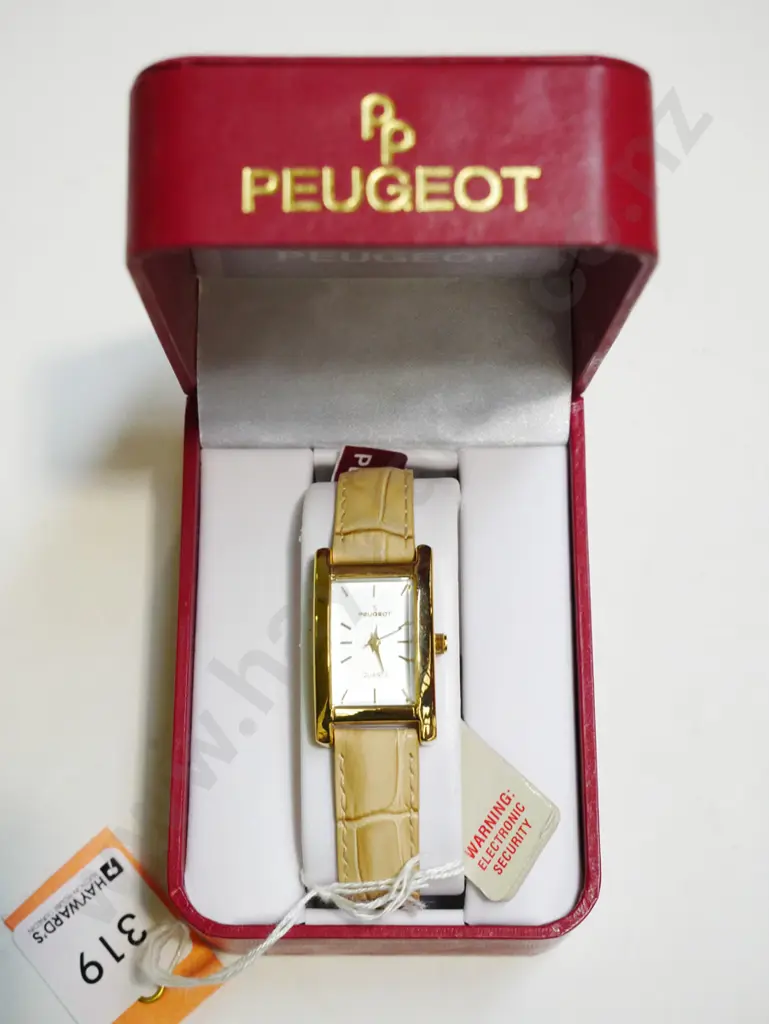 cased ladies Peugot golden and leather strap wristwatch Image 1++