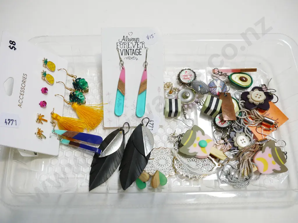 tray of earrings Image 1++
