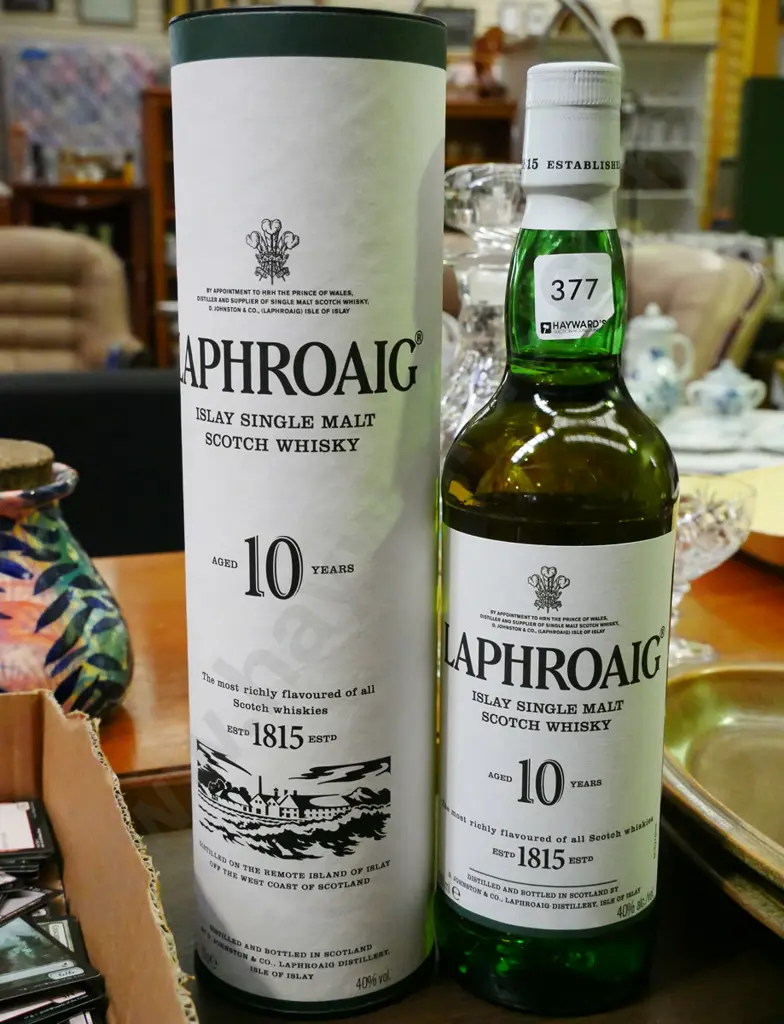 bottle of Laphroaig single malt Scotch whisky and case Image 1++