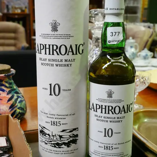 bottle of Laphroaig single malt Scotch whisky and case