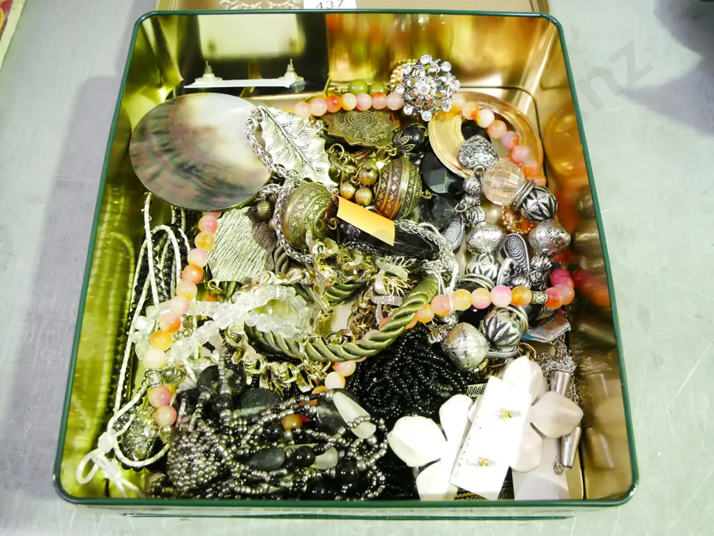 tin of costume jewellery Image 1++