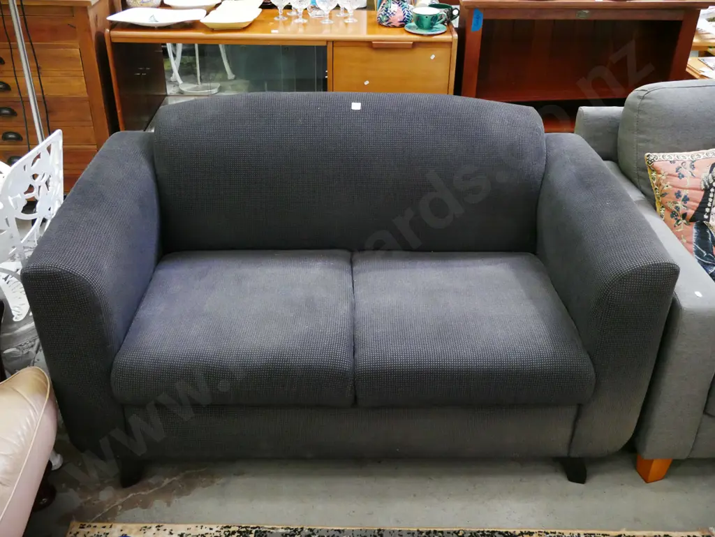 charcoal upholstered 2 seater settee Image 1++