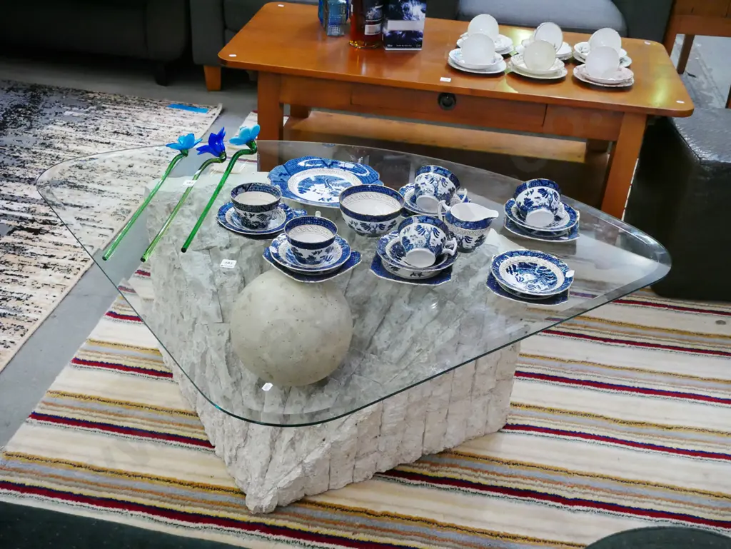 composite based bevelled edge glass top triangular coffee table H-410 W-1260 D-950 Image 1++