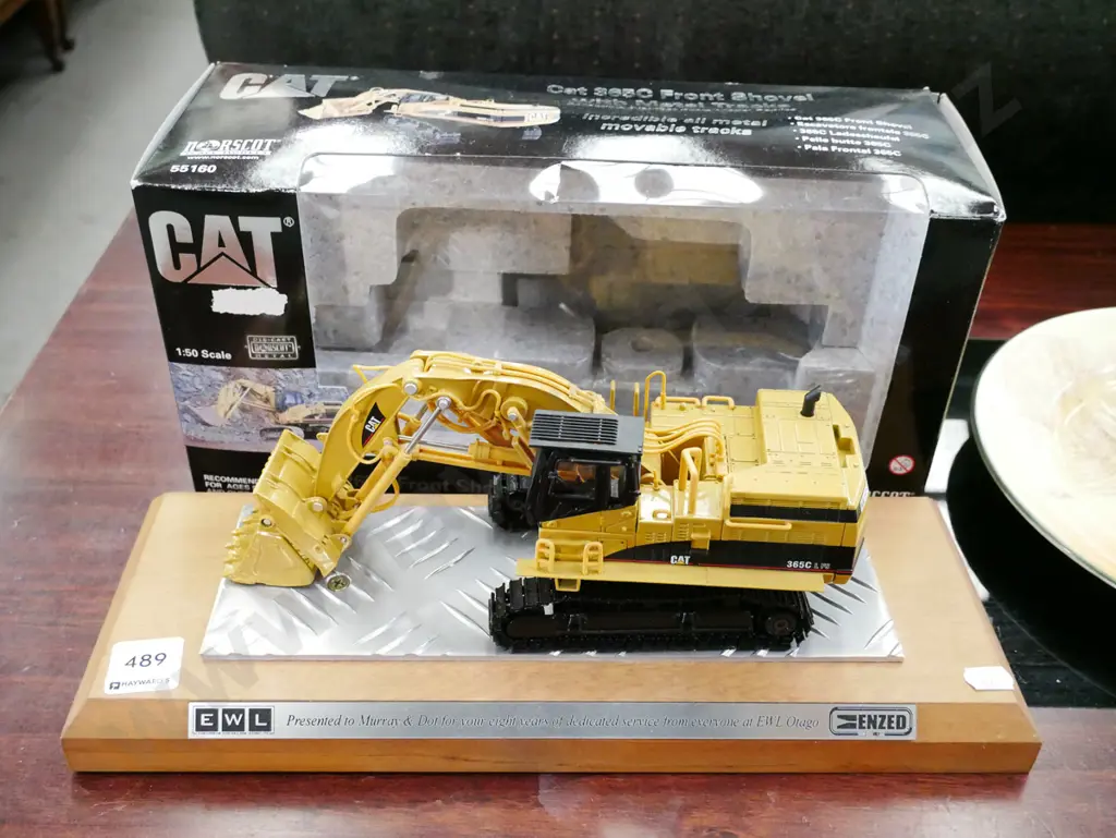 die cast scale model 1:50 of a Cat 365C front shovel with metal track on presentation base Image 1++