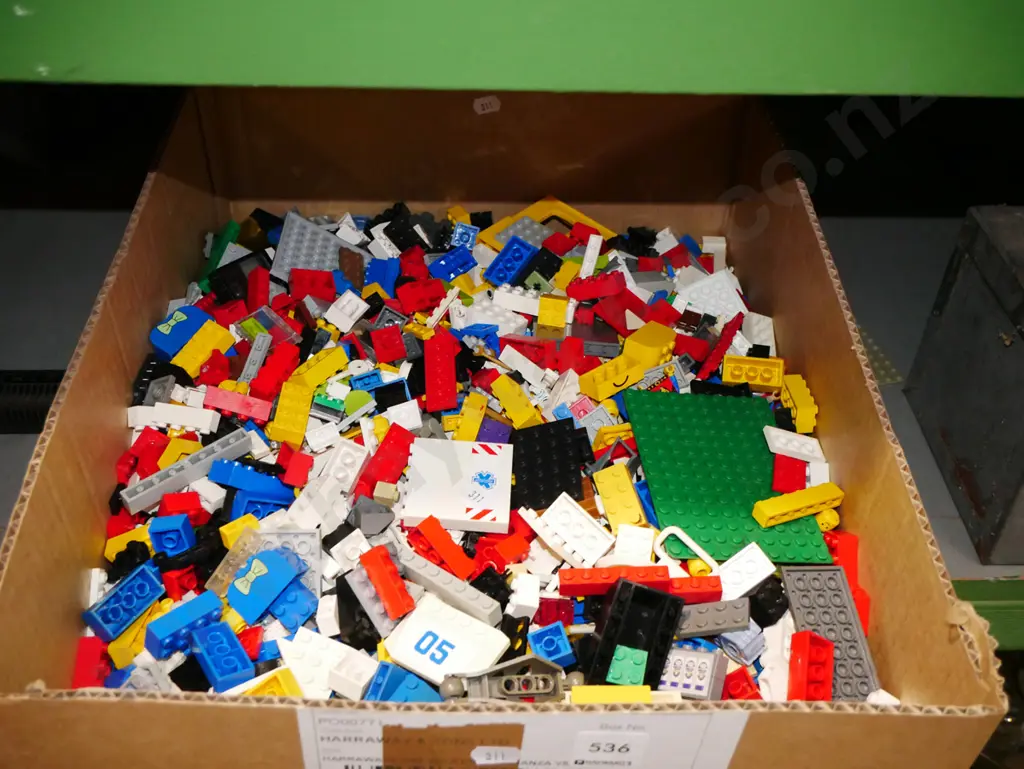 box of Lego pieces Image 1++