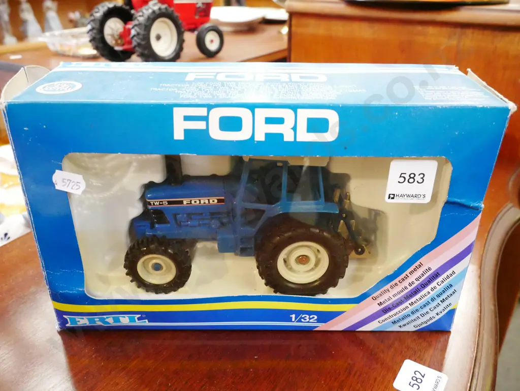die cast 1:32 scale model of a Ford TW-5 tractor Image 1++