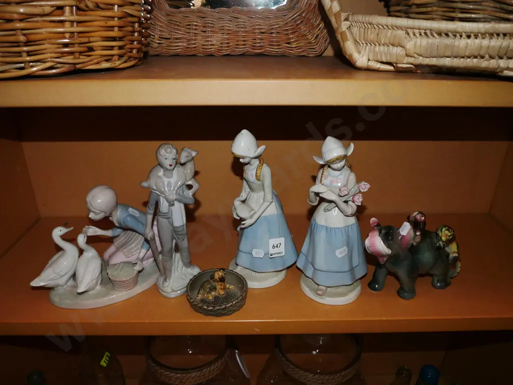 shelf of figurines Image 1++