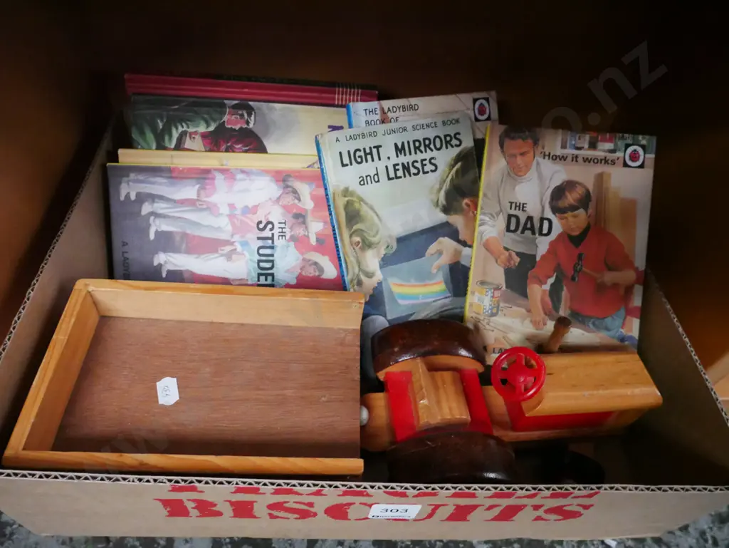 box; wooden tractor and trailer, shanty town badge, adult parody books Image 1++