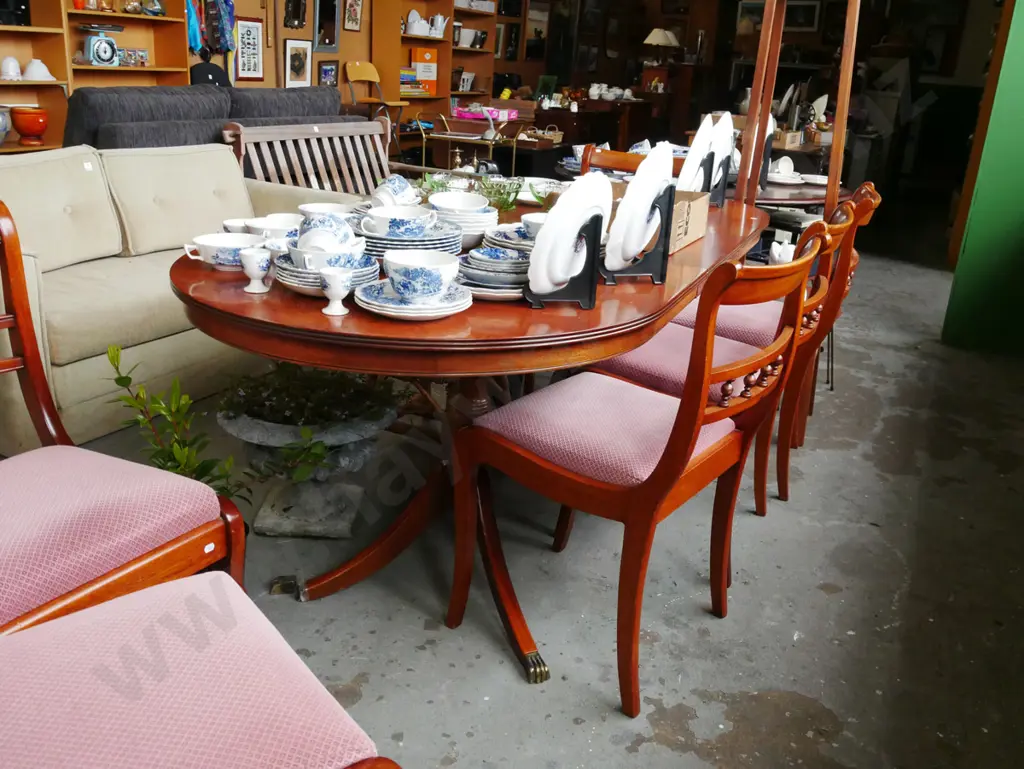 extending mahogany dining table with 6 spindleback chairs - 1 brass claw foot needs attention  Image 1++