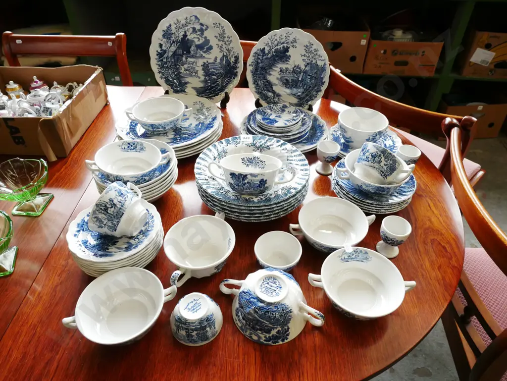 assorted blue and white items; plates, bowls, cups Image 1++