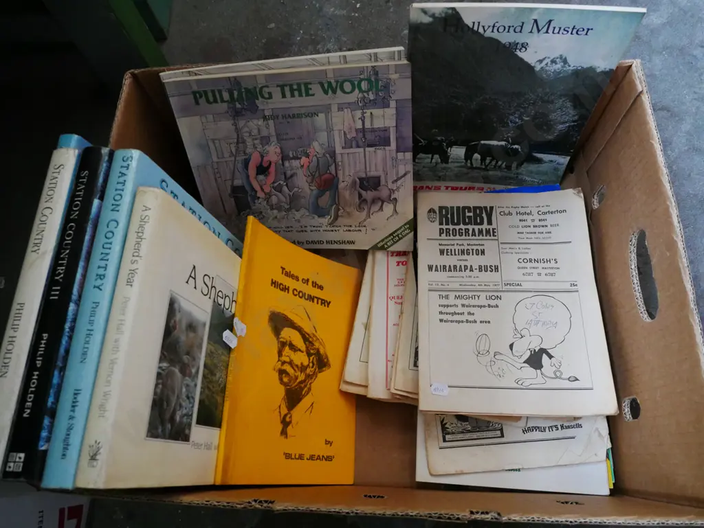 box; NZ high country station books, 1970s rugby programmes Image 1++