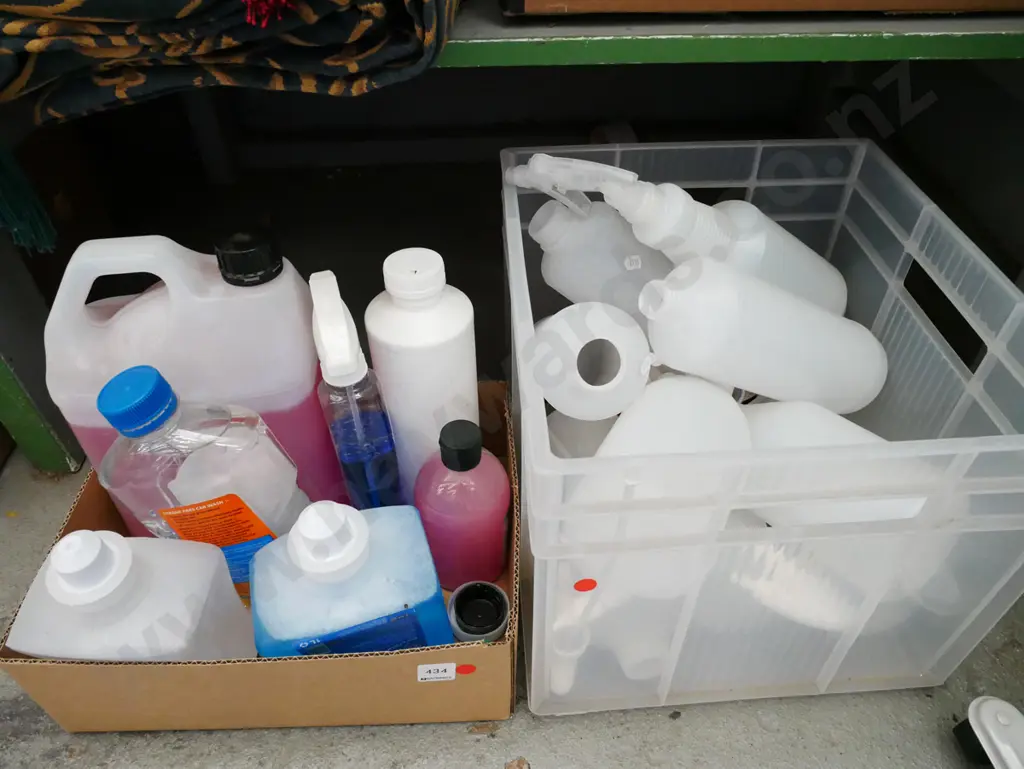 box; various cleaning chemicals, plastic tub of spray bottles - red dots Image 1++