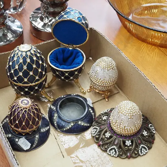 box; ornate Faberge style eggs and various stands