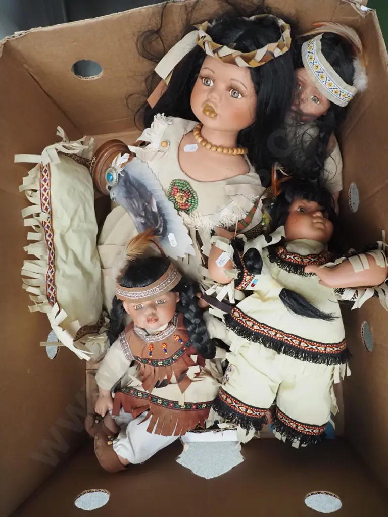 box of First Nation porcelain dolls Image 1++