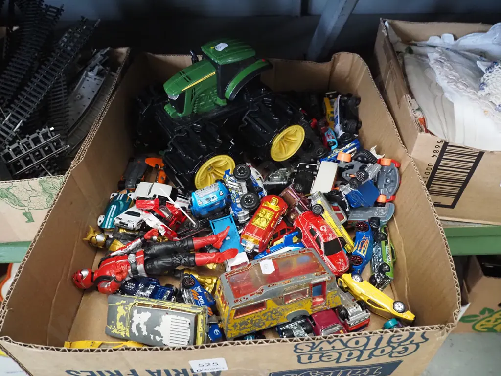 box of toy vehicles and figurines Image 1++
