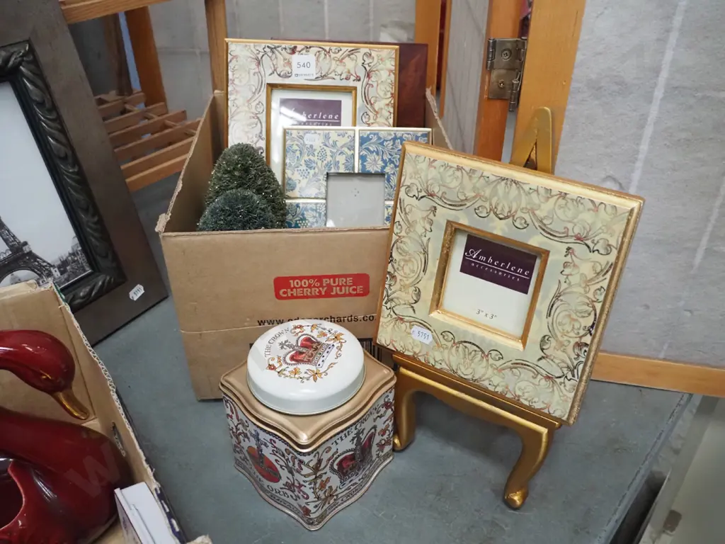 box; photo frames, faux topiary trees, tin tea caddy, easel Image 1++
